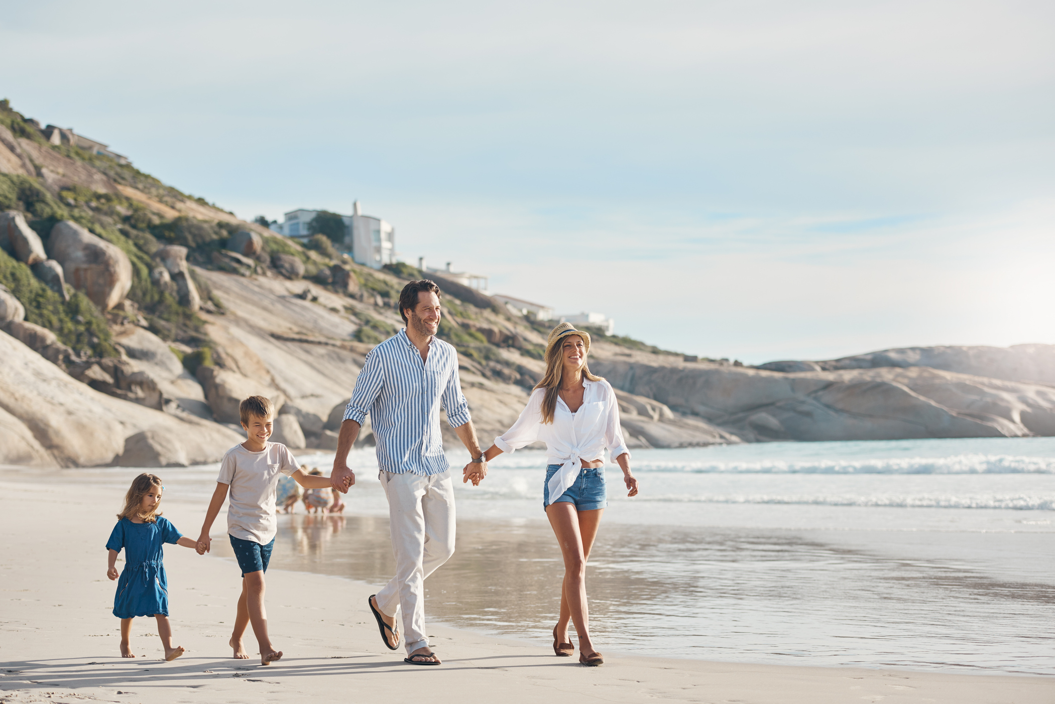 Family relaxing together on a dock